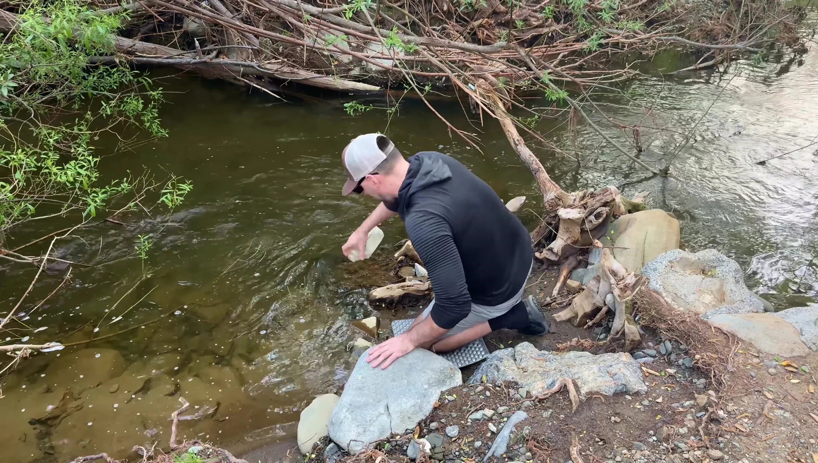 The Z Seat used as a kneeling pad for cooking.