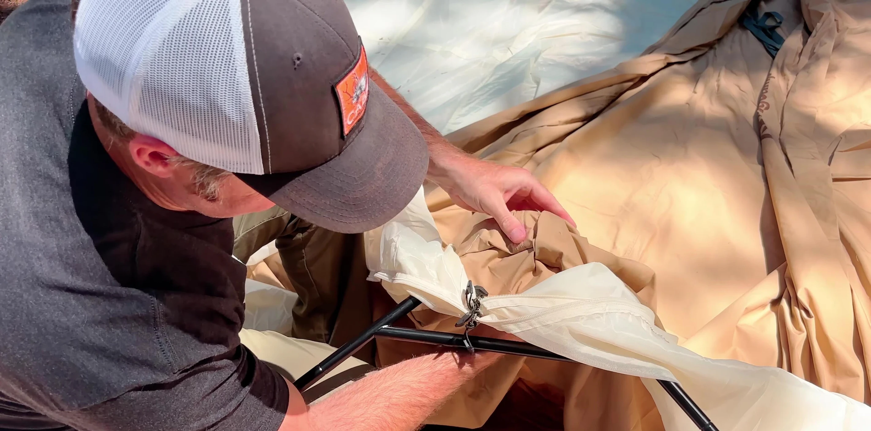 Securing the arch support poles.