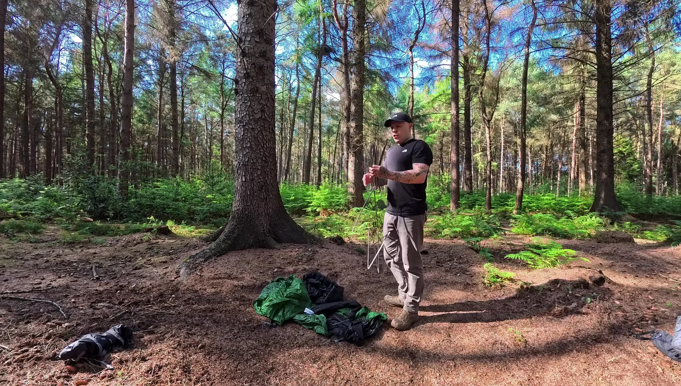 Assembling the tent poles.