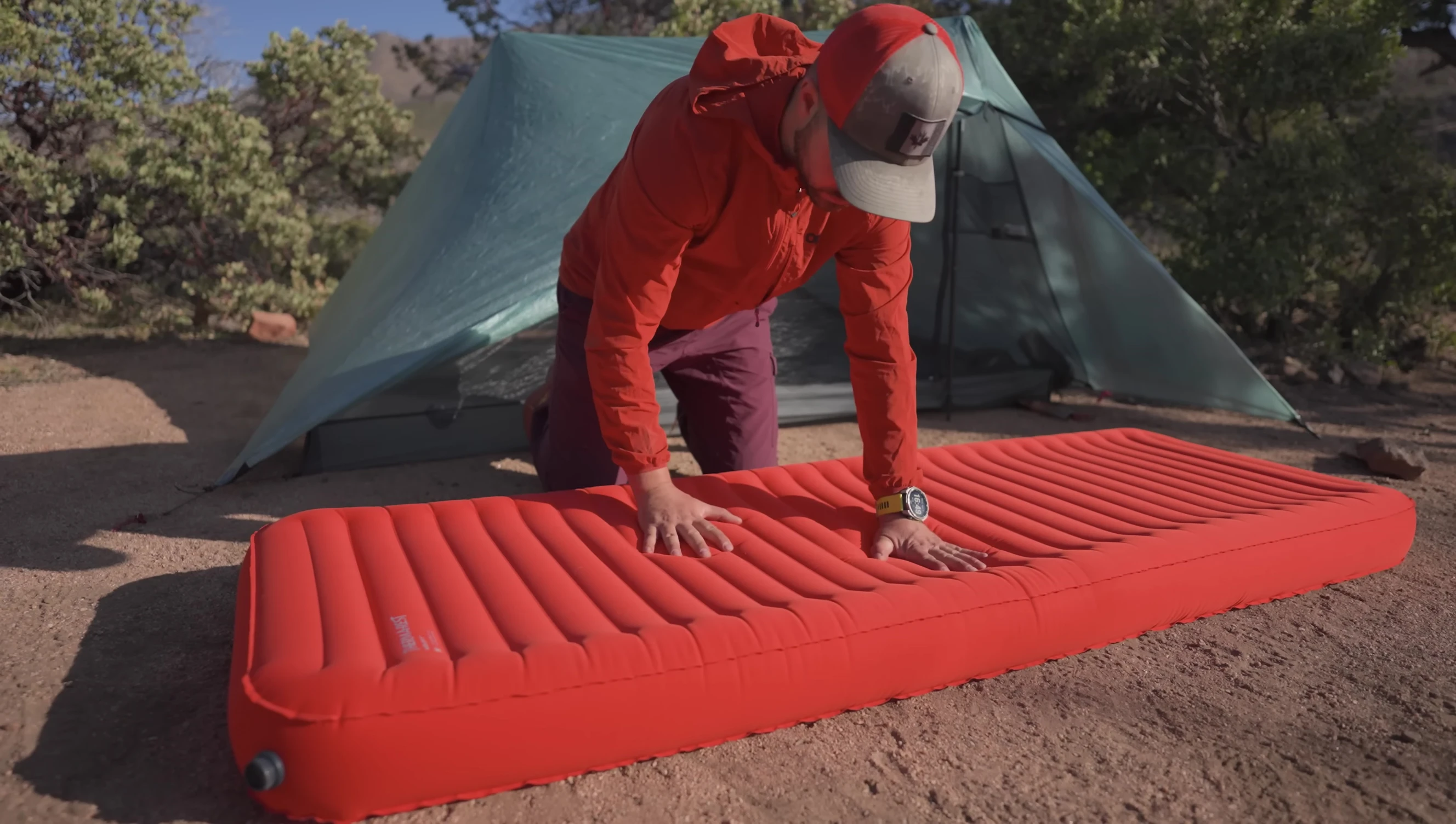 The Therm-a-Rest NeoAir XLite sleeping pad showcased for its superior pressure relief.