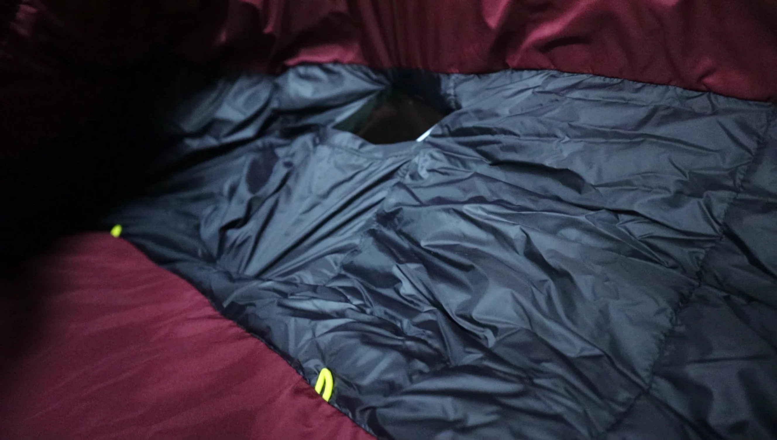 Close-up of the hood pockets and fasteners