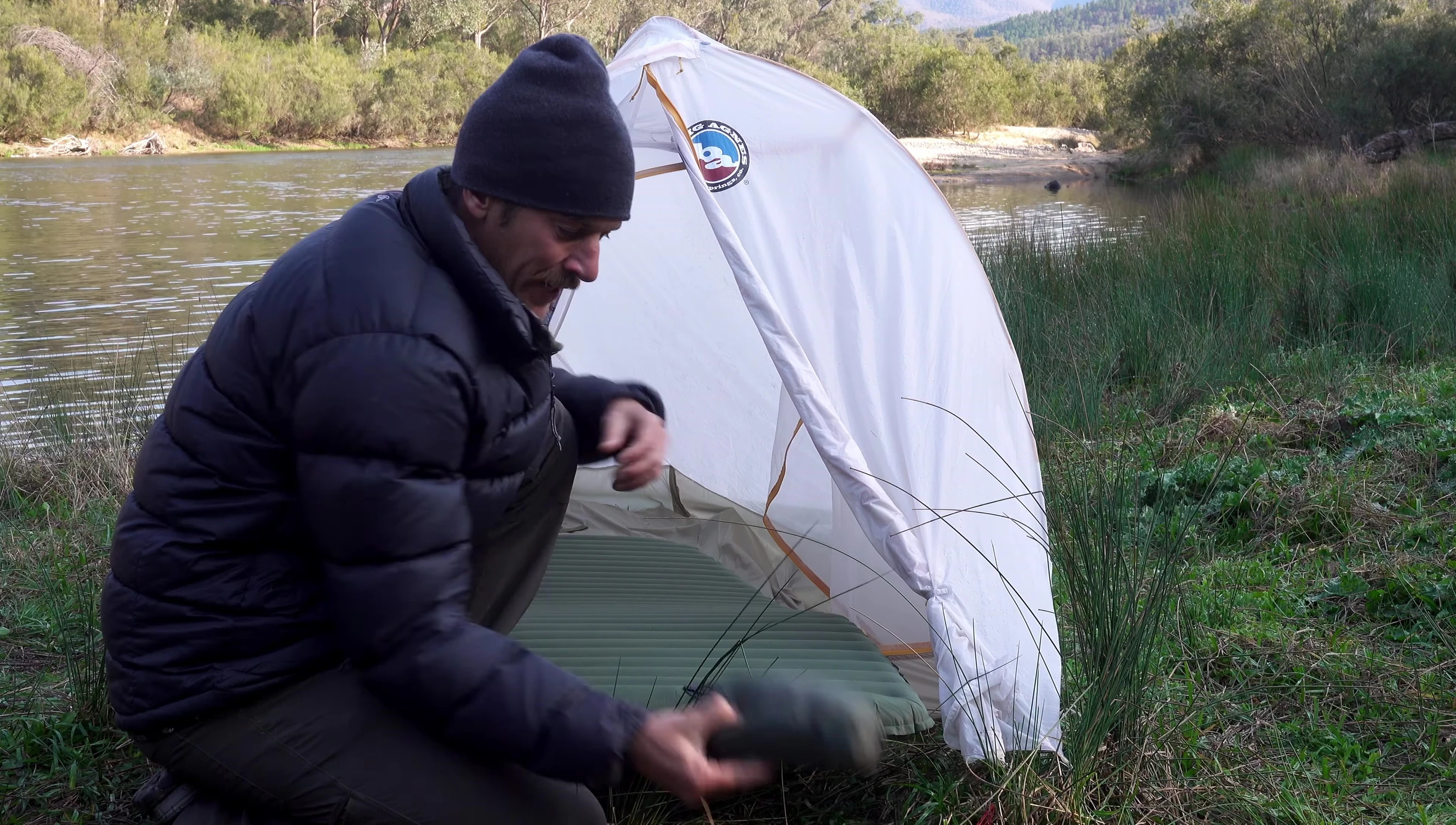 Putting on the fitted sheet