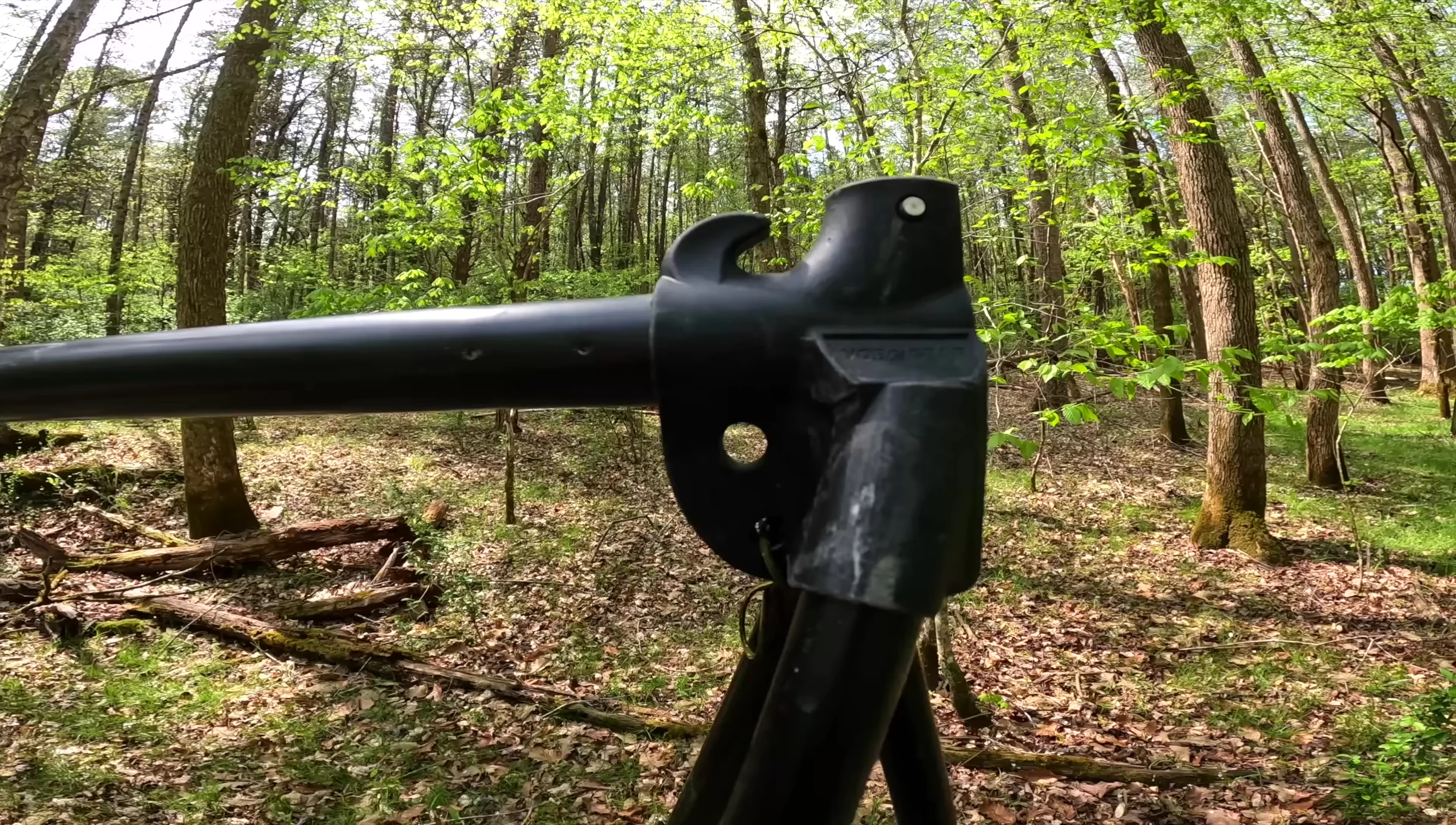 Close-up of the stand's hub, highlighting the kickstand and outrigger attachment point.