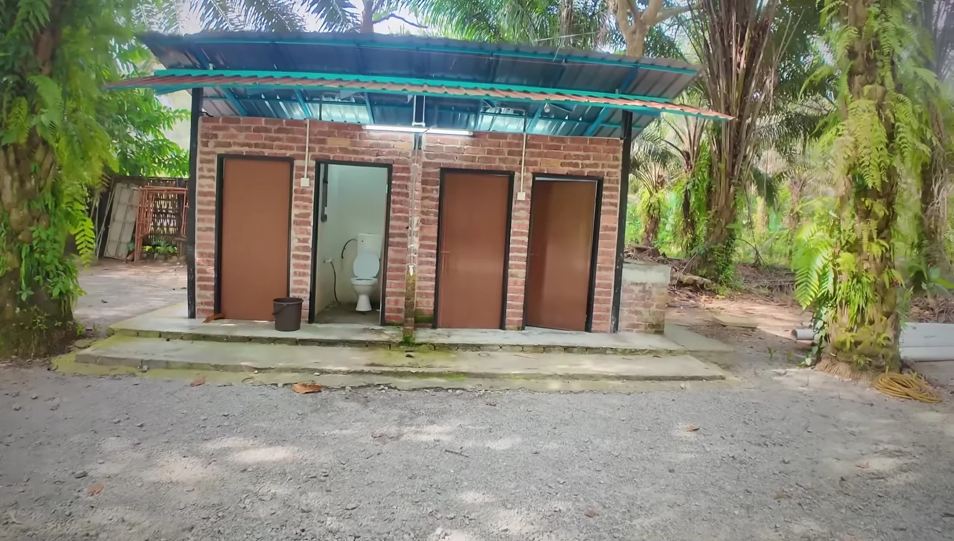 The toilet and bathroom facilities.