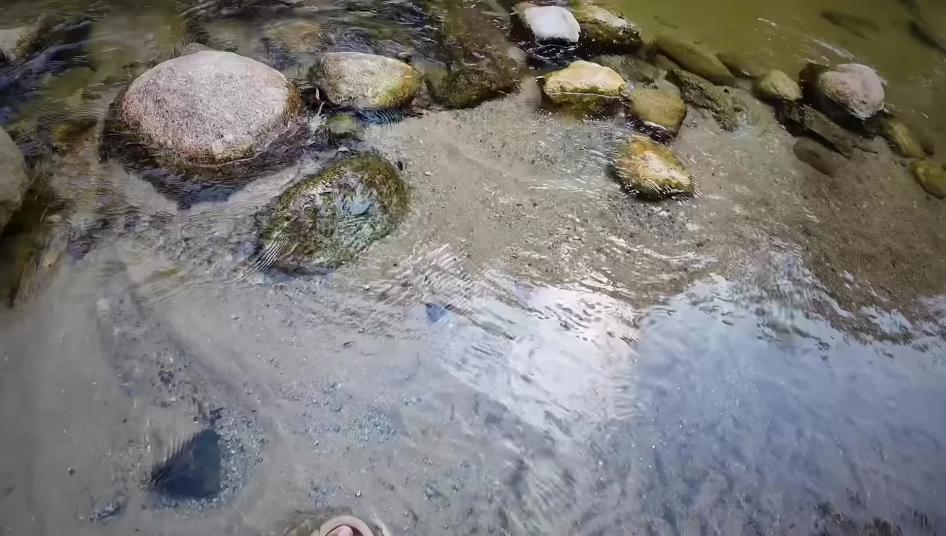 The calm waters of the Sahum River suitable for bathing.