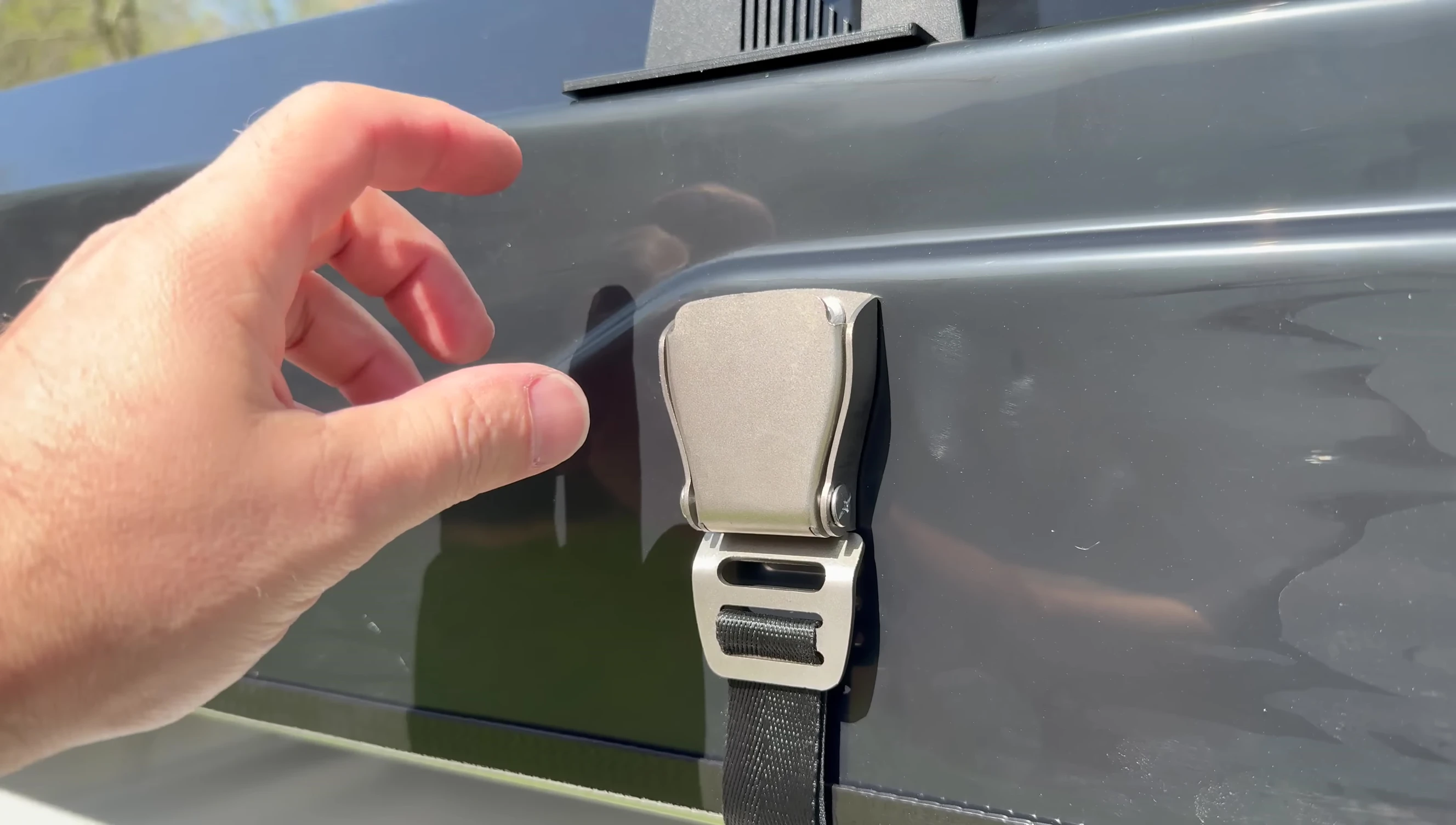 The latches and rope used to open the tent.