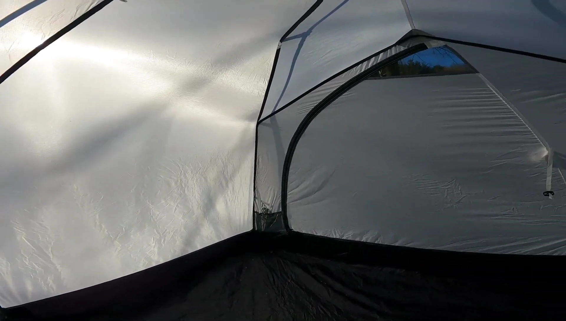 A close-up shot that emphasizes the storage pockets inside the tent