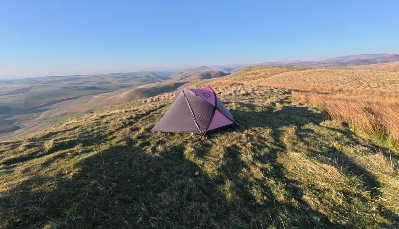 The Samaya Inspire 2 tent pitched in a picturesque location.