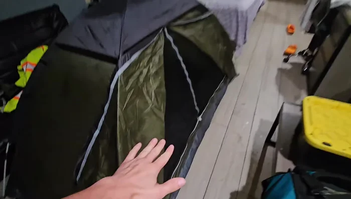 Use a damp face cloth to clean the inside of the tent, removing sand and debris.