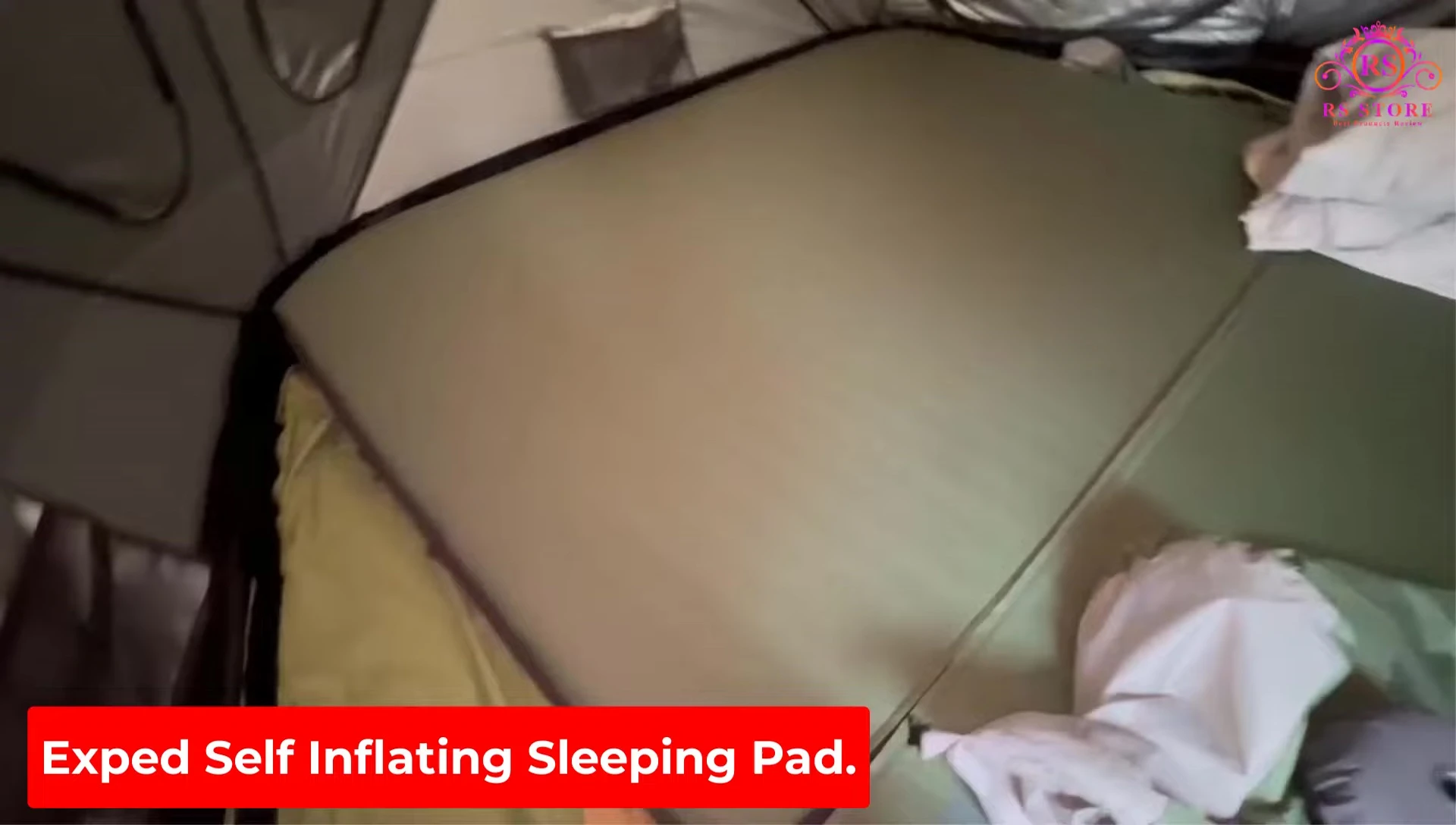 The Exped MegaMat Duo 10 sleeping pad displayed, showing its size and plush construction.