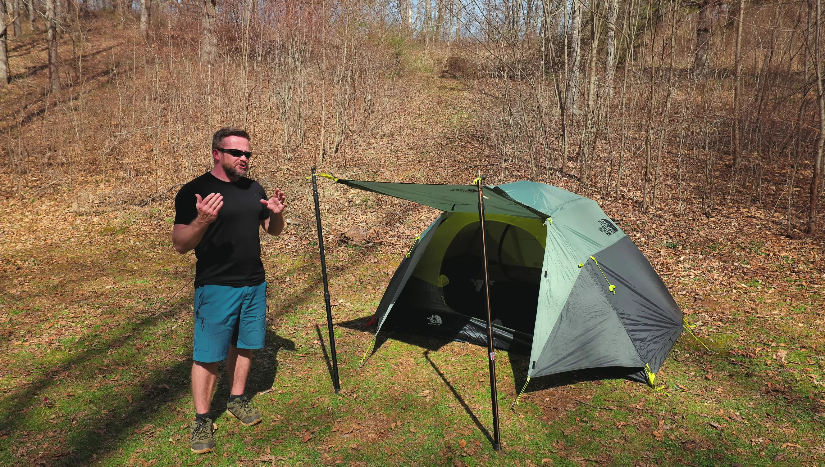 The presenter discussing the affordable price of the tent.