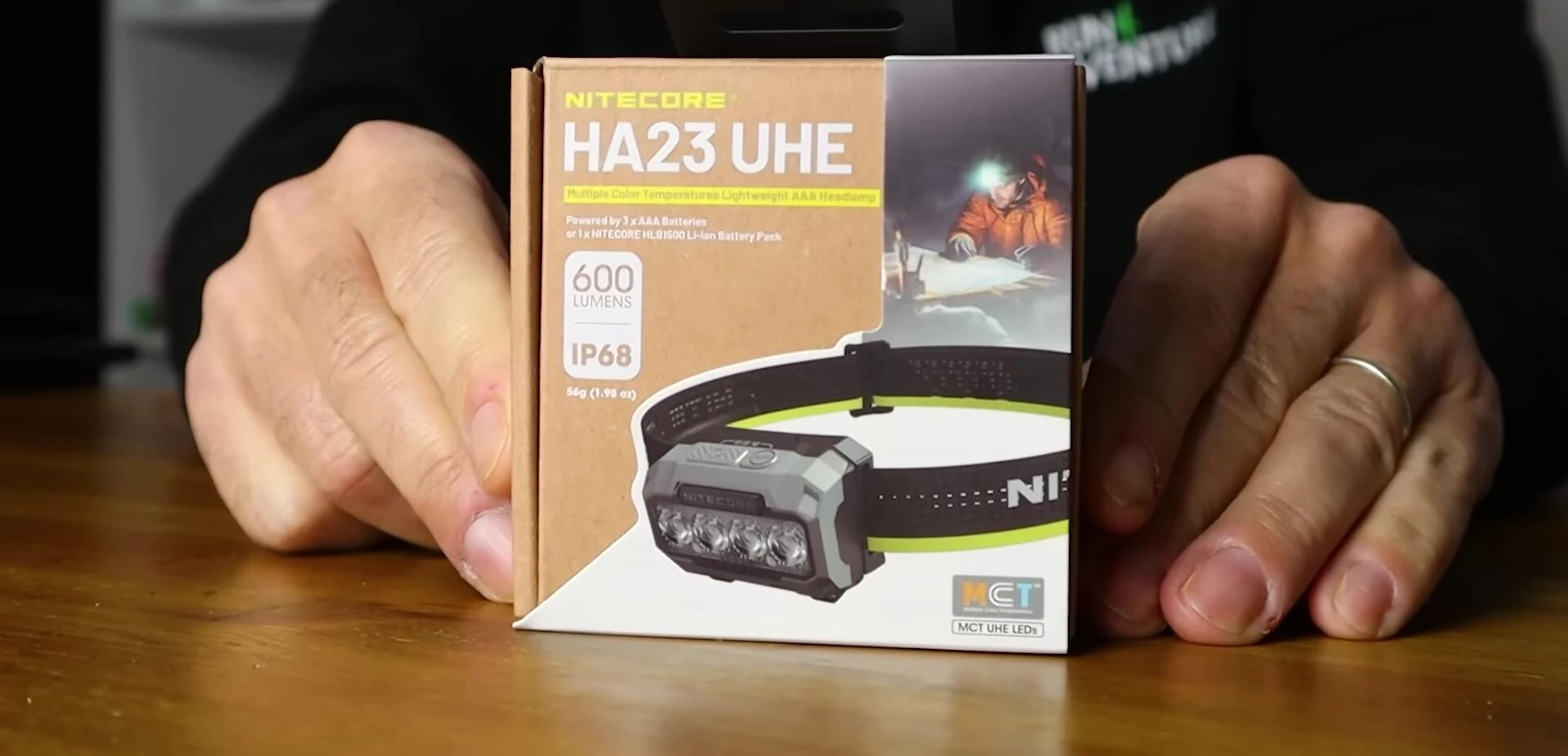 The compact box containing the NITECORE HA23 UHE headlamp and accessories.