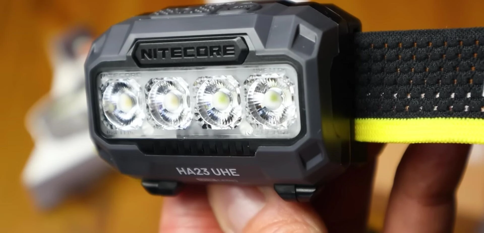 The headlamp's lightweight design, emphasizing its 56g weight.