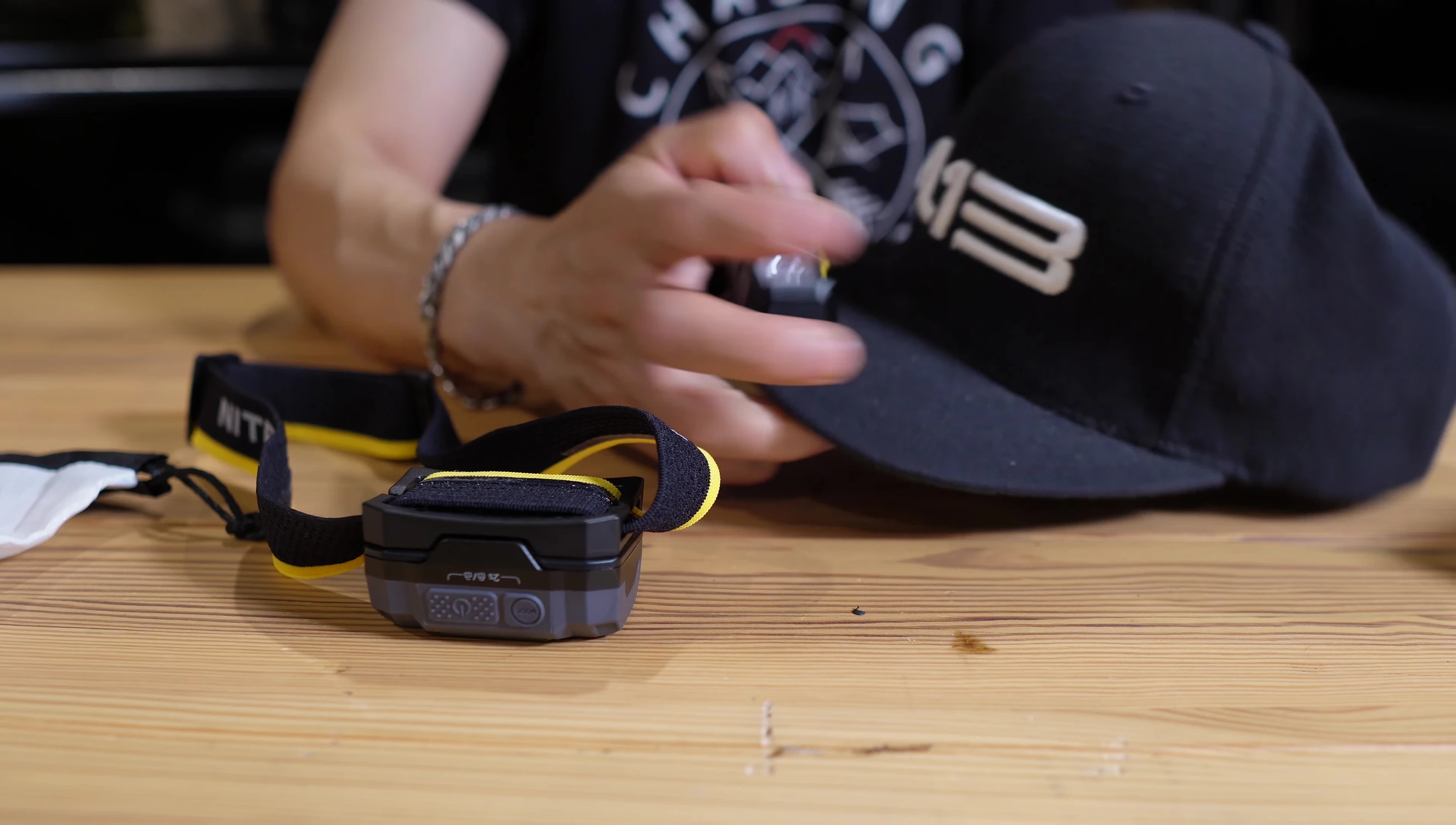 Demonstrating the HA23 headlamp's hat clip