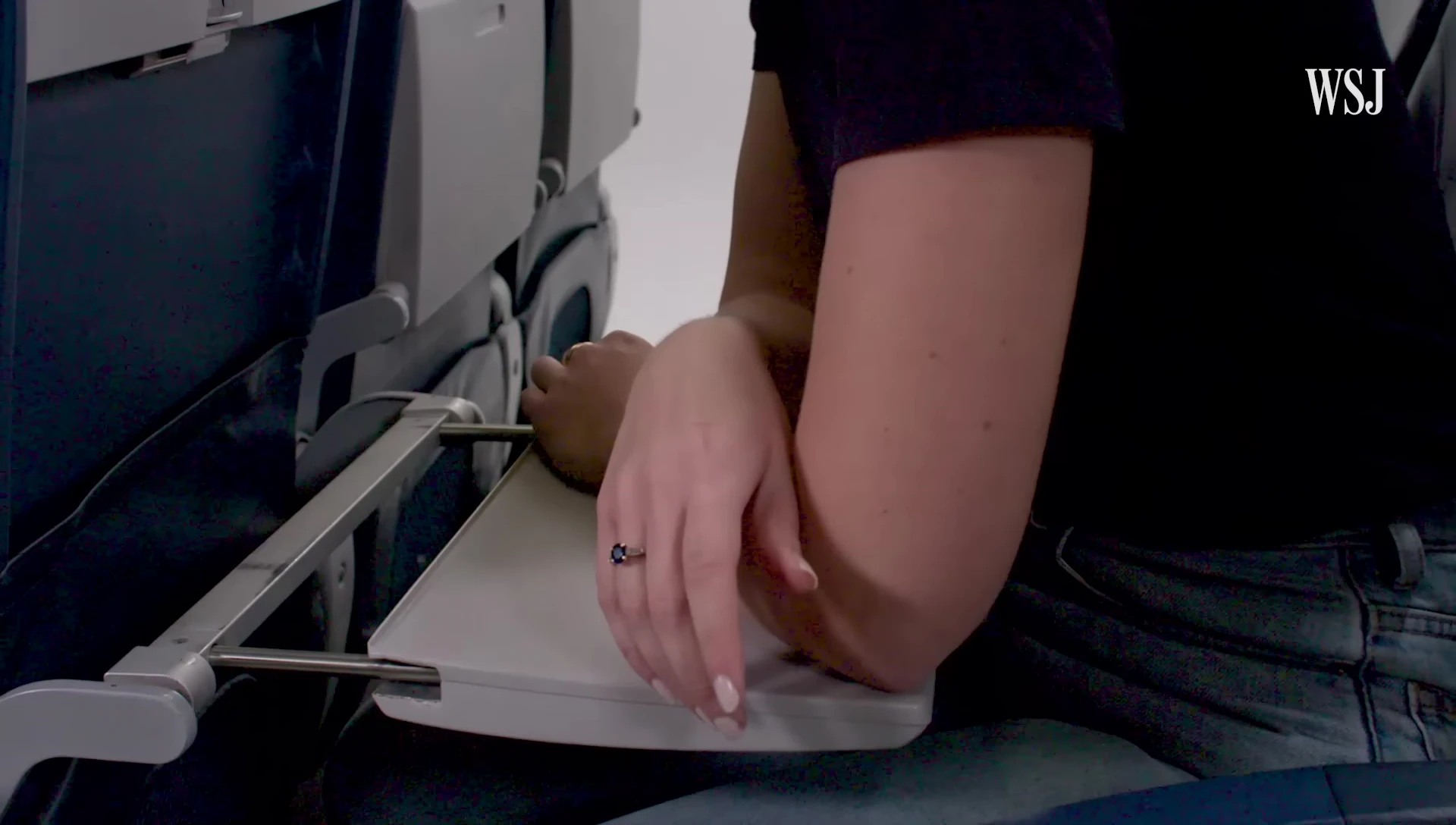 Close-up shot illustrating contact pressure points on the tray table.