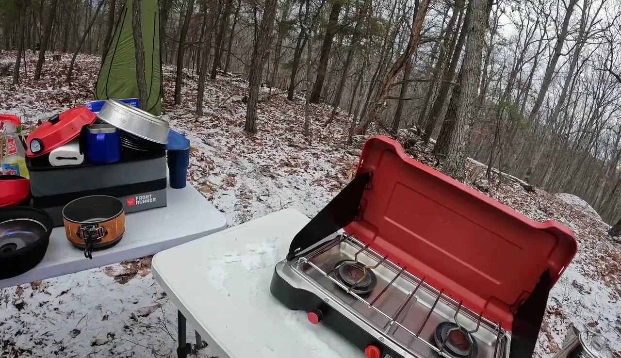 The stove in use during windy conditions.