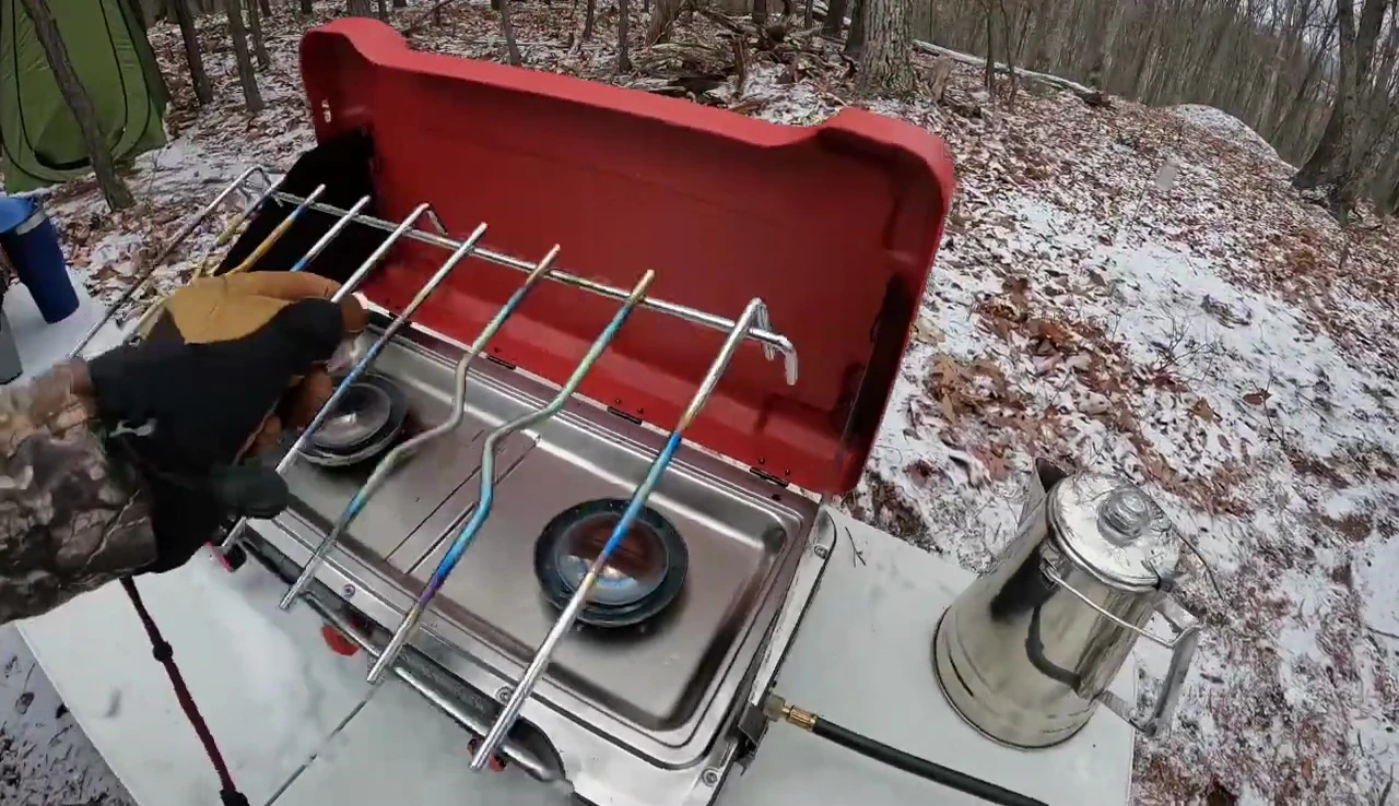 Cleaning the stove after use.