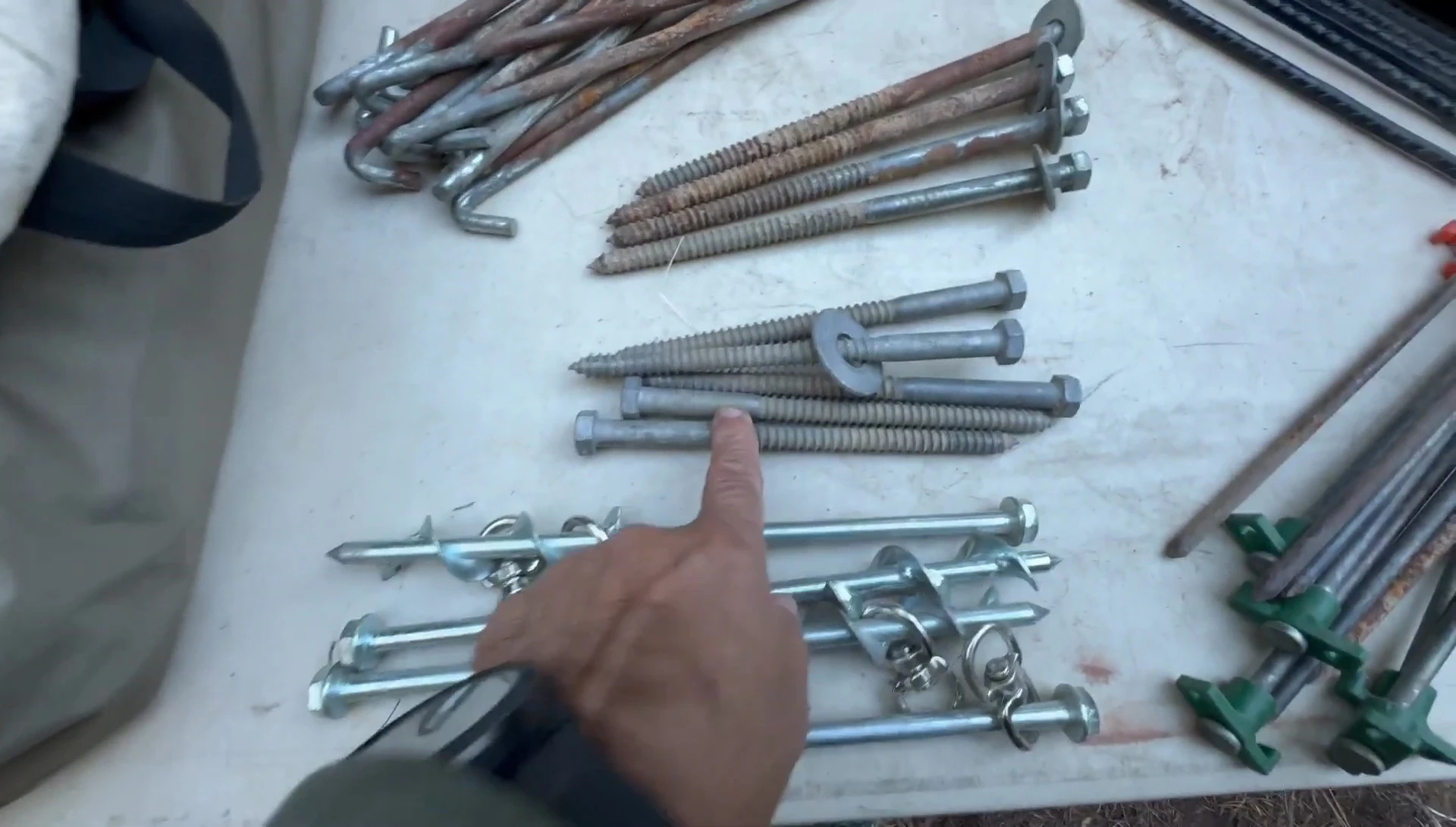 Variety of lag bolts and washers.