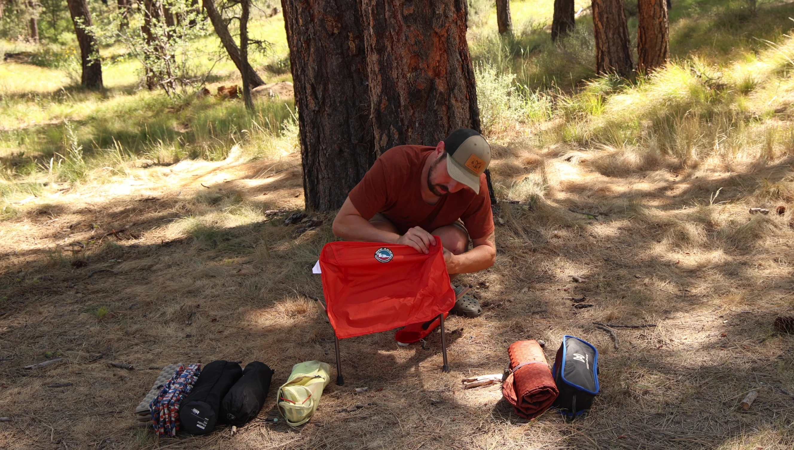 The reviewer demonstrating the assembled Big Agnes Skyline UL stool.