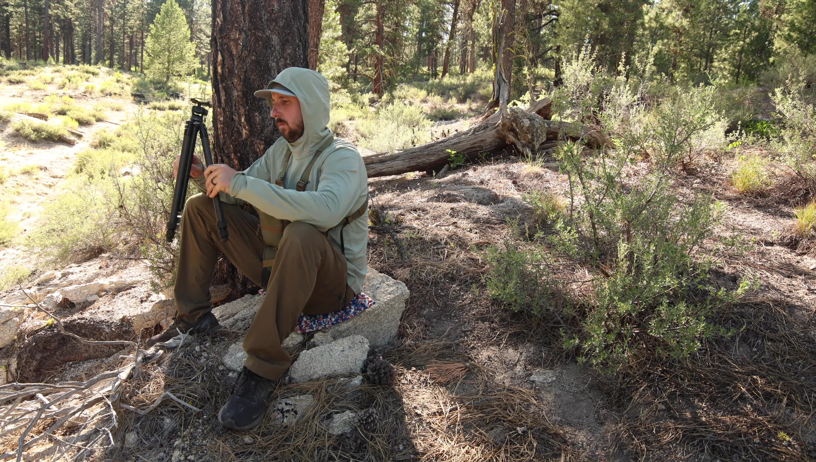 The reviewer showing the Chipper deployed as a chair.