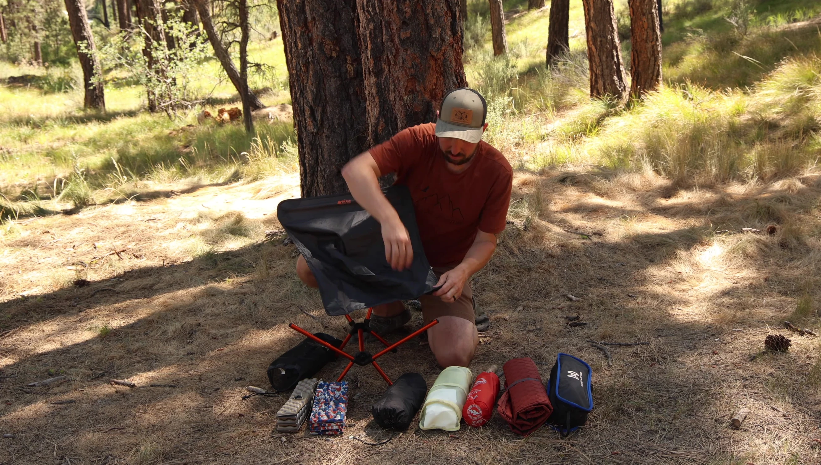 The reviewer demonstrating the chair's instability.