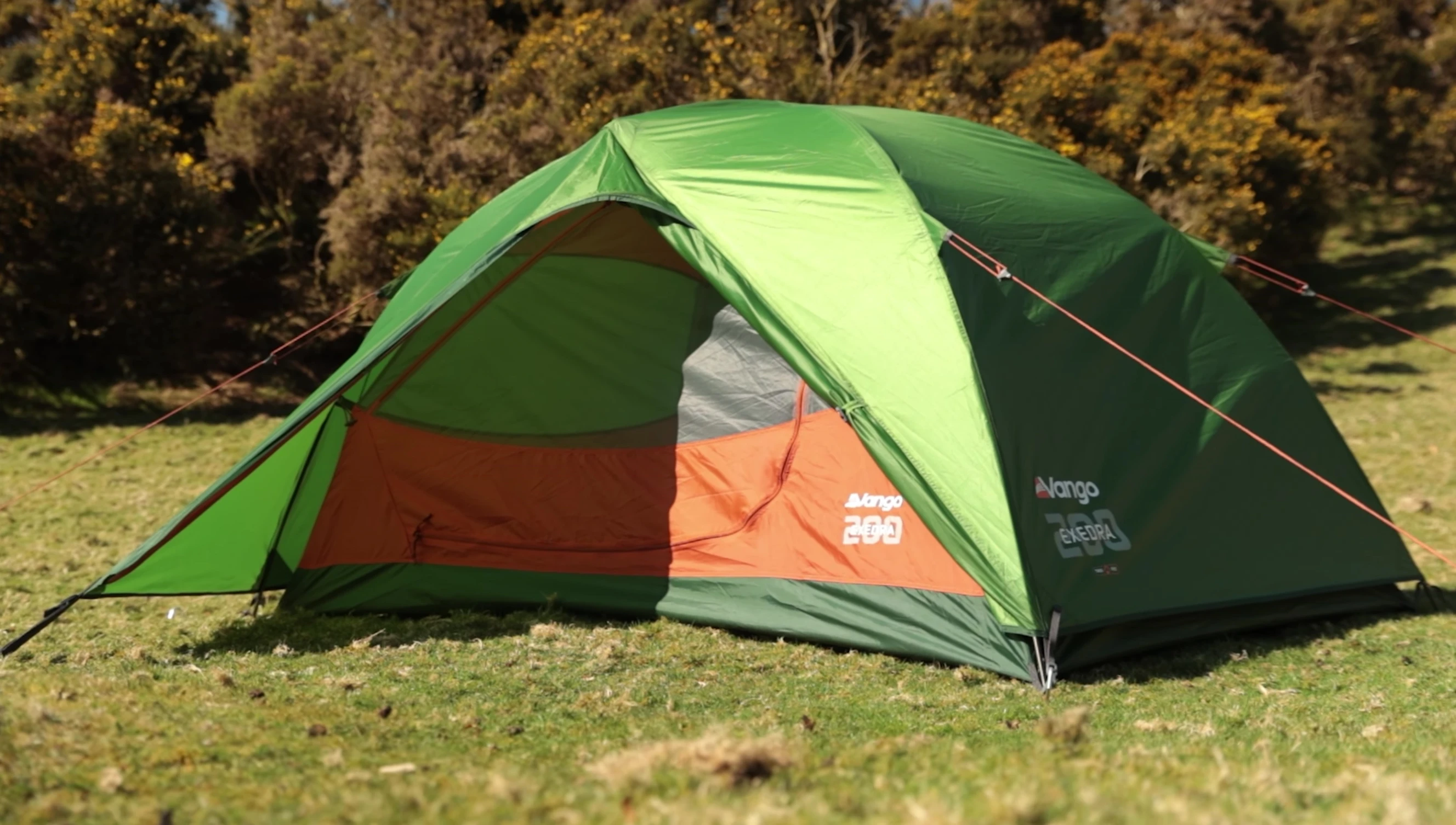 Demonstrating the roll-back porch feature of the tent.
