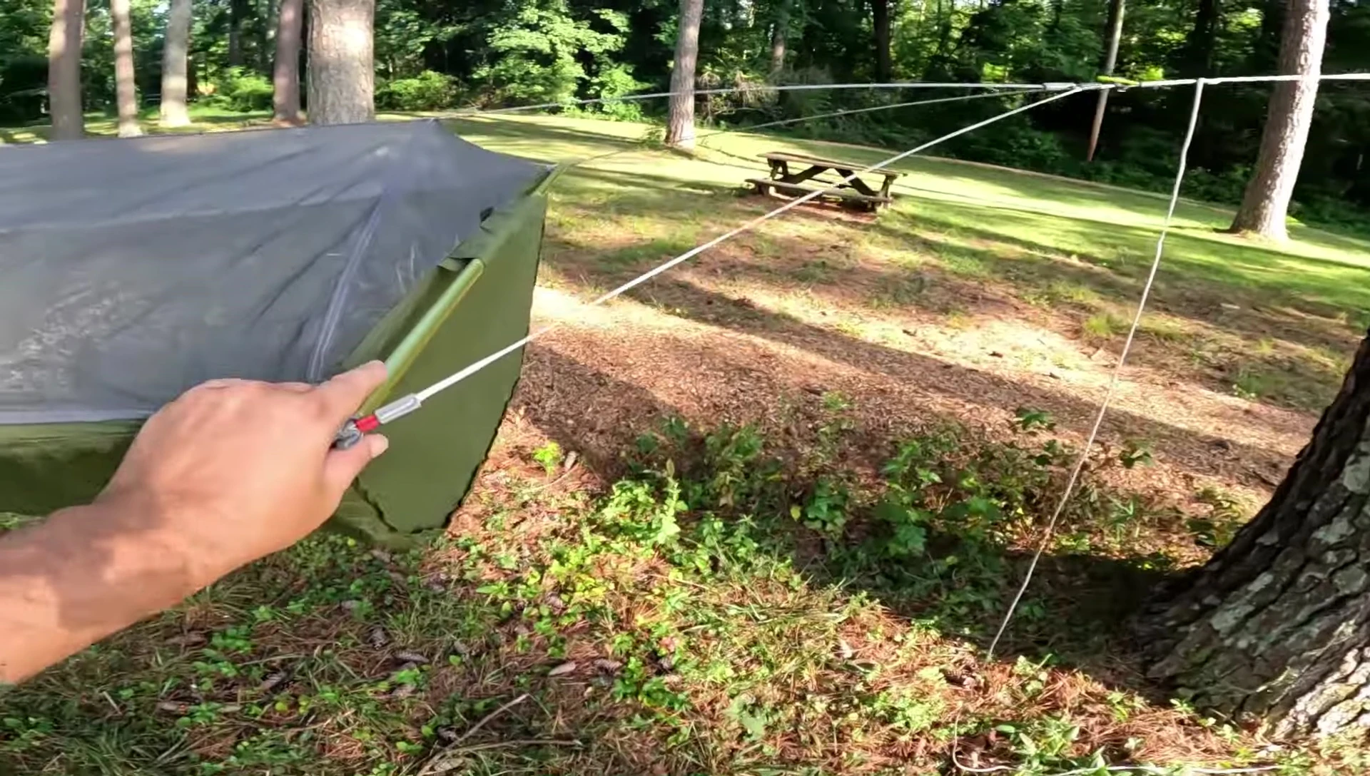 The reviewer explaining the benefits of the bridge design.