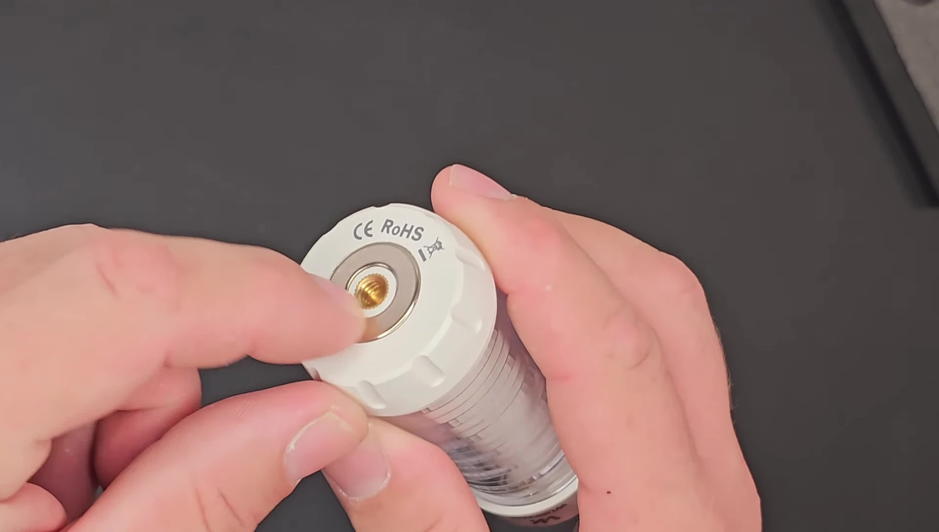 Close-up of the quarter-inch mounting point on the Wurkkos CL01.