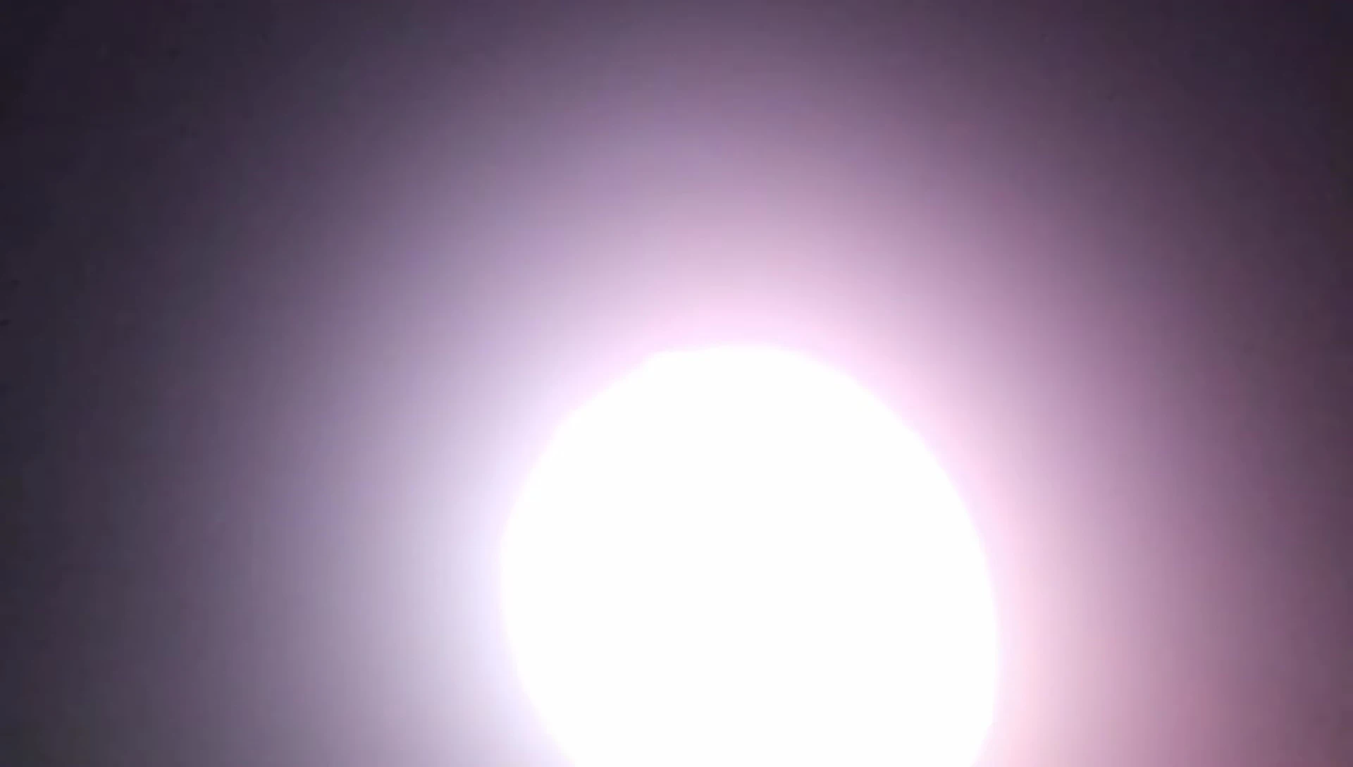 Nighttime shot of the Wurkkos CL01 showing various RGB settings.