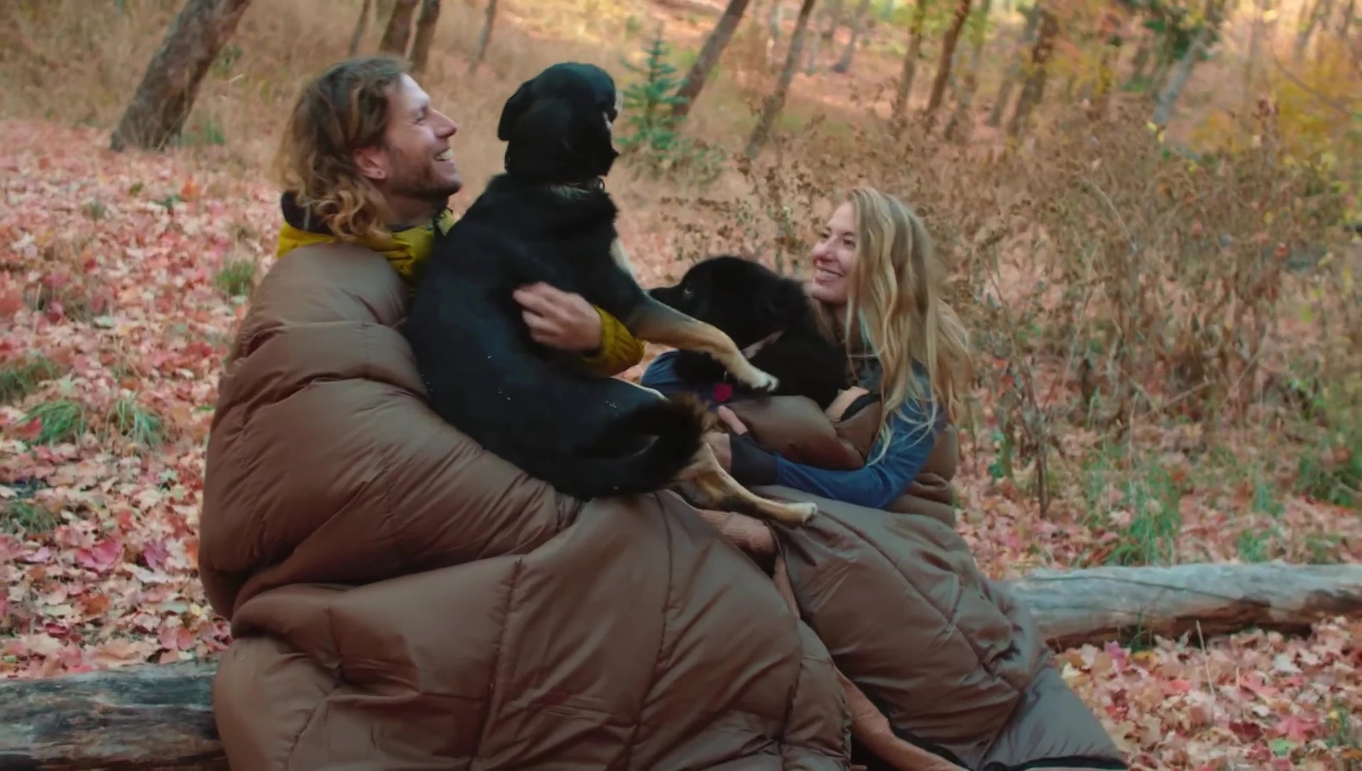 The bag fully unzipped, showcasing its dual-blanket functionality