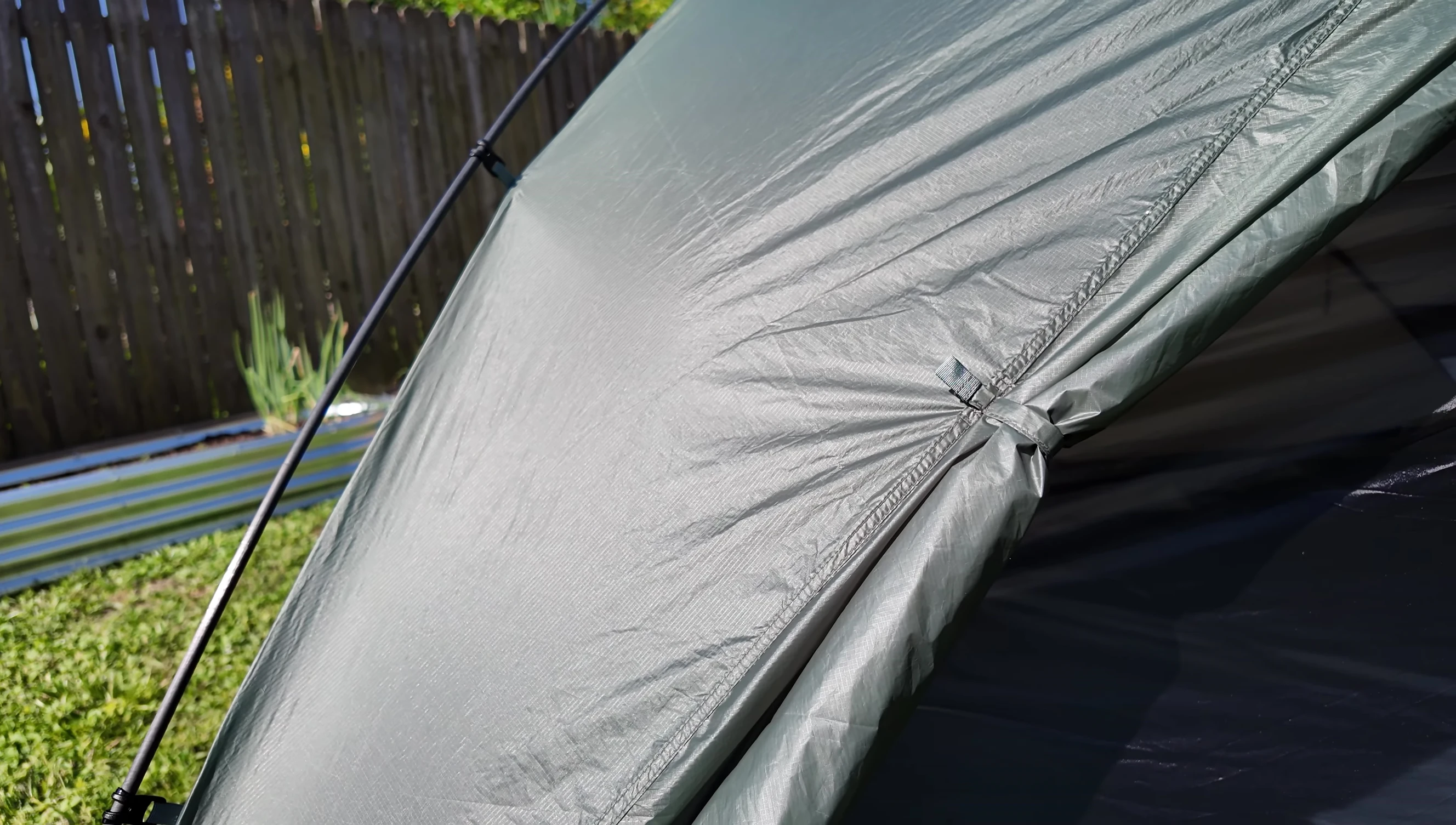 Interior shot showcasing the pockets, hang loops, and overall spaciousness of the tent.