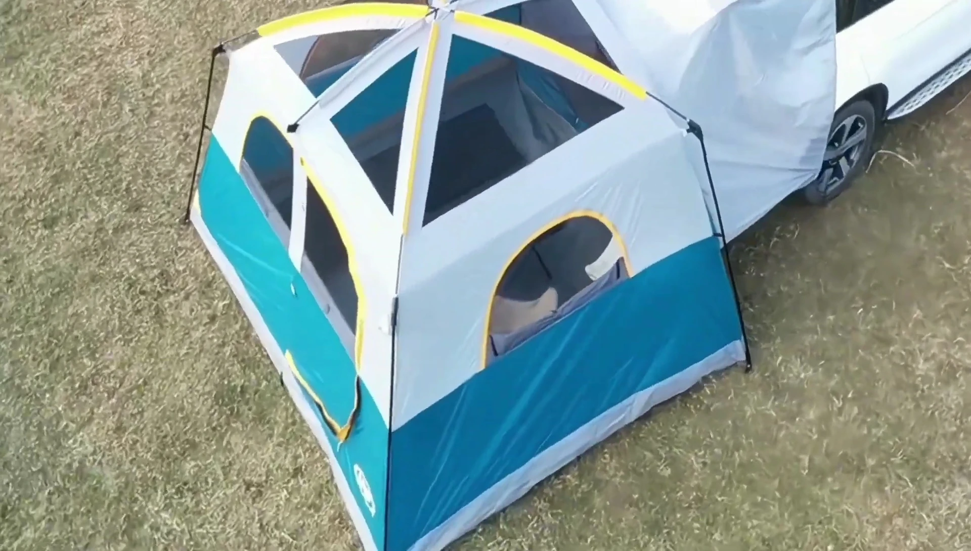 UNP SUV Tailgate Tent attached to a vehicle