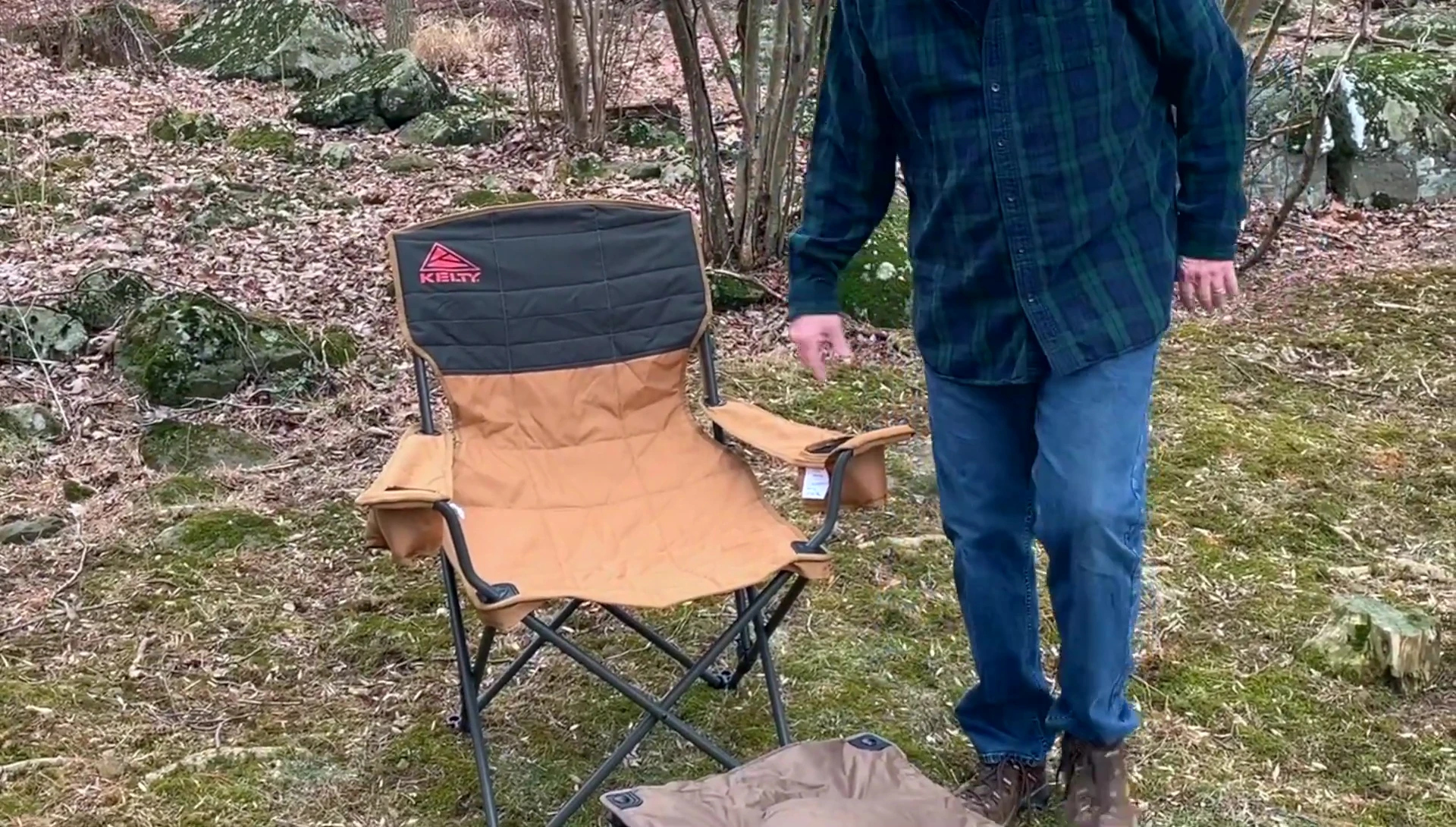 Reviewer sitting comfortably in the Kelty chair.