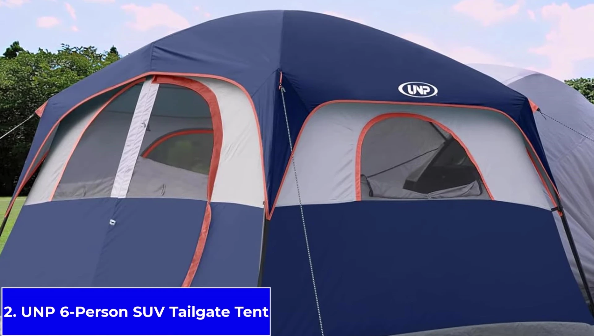 The UNP tent attached to an SUV tailgate.